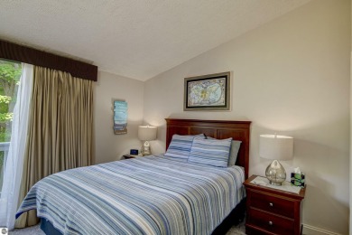 Welcome to the beautiful beach and towering pines of The Shores on Grand Traverse Resort and Spa in Michigan - for sale on GolfHomes.com, golf home, golf lot