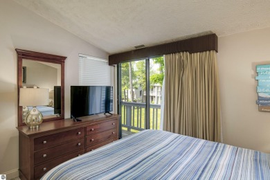 Welcome to the beautiful beach and towering pines of The Shores on Grand Traverse Resort and Spa in Michigan - for sale on GolfHomes.com, golf home, golf lot