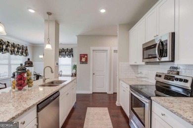 Located in the highly sought-after Traditions of Braselton, this on Traditions of Braselton Golf Club in Georgia - for sale on GolfHomes.com, golf home, golf lot