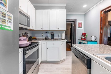 Welcome to this beautifully updated 3-bedroom, 1.5-bath home on Community Golf Center  in Ohio - for sale on GolfHomes.com, golf home, golf lot