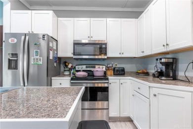 Welcome to this beautifully updated 3-bedroom, 1.5-bath home on Community Golf Center  in Ohio - for sale on GolfHomes.com, golf home, golf lot