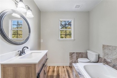 Welcome to 12831 Douglas Lane -- a peaceful retreat set on over on Big Sugar Golf Club in Arkansas - for sale on GolfHomes.com, golf home, golf lot