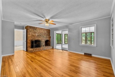 Discover Timeless Elegance and Comfort in this Custom Built on Forest Oaks Country Club in North Carolina - for sale on GolfHomes.com, golf home, golf lot