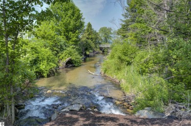 Welcome to the beautiful beach and towering pines of The Shores on Grand Traverse Resort and Spa in Michigan - for sale on GolfHomes.com, golf home, golf lot