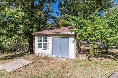 Welcome to 12831 Douglas Lane -- a peaceful retreat set on over on Big Sugar Golf Club in Arkansas - for sale on GolfHomes.com, golf home, golf lot