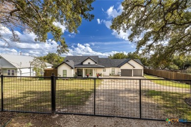 Welcome to this stunning custom-built home with a spacious on Canyon Lake Golf Club in Texas - for sale on GolfHomes.com, golf home, golf lot