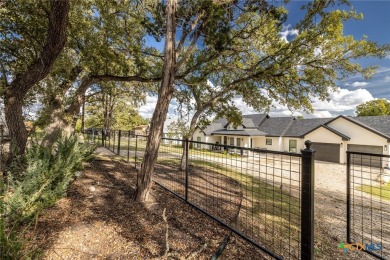 Welcome to this stunning custom-built home with a spacious on Canyon Lake Golf Club in Texas - for sale on GolfHomes.com, golf home, golf lot