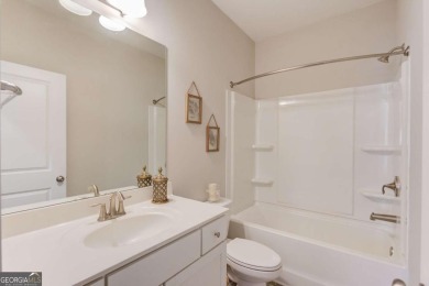 Located in the highly sought-after Traditions of Braselton, this on Traditions of Braselton Golf Club in Georgia - for sale on GolfHomes.com, golf home, golf lot