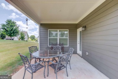 Located in the highly sought-after Traditions of Braselton, this on Traditions of Braselton Golf Club in Georgia - for sale on GolfHomes.com, golf home, golf lot