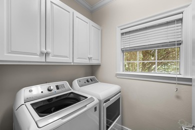 Welcome home! This beautifully detailed executive residence is on Tiger Point Golf and Country Club in Florida - for sale on GolfHomes.com, golf home, golf lot