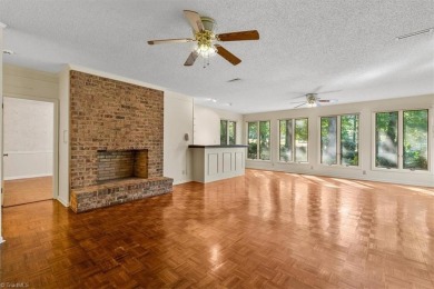 Discover Timeless Elegance and Comfort in this Custom Built on Forest Oaks Country Club in North Carolina - for sale on GolfHomes.com, golf home, golf lot