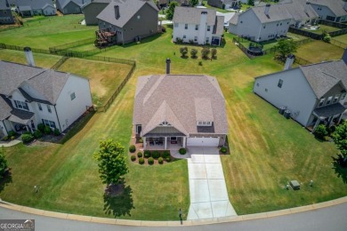 Located in the highly sought-after Traditions of Braselton, this on Traditions of Braselton Golf Club in Georgia - for sale on GolfHomes.com, golf home, golf lot