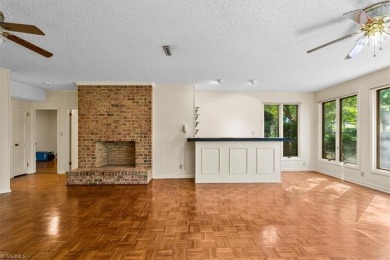 Discover Timeless Elegance and Comfort in this Custom Built on Forest Oaks Country Club in North Carolina - for sale on GolfHomes.com, golf home, golf lot