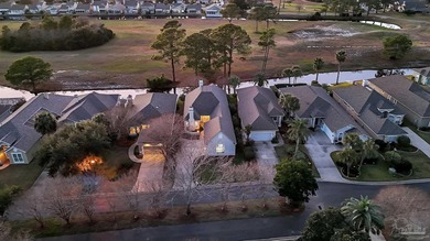 Welcome home! This beautifully detailed executive residence is on Tiger Point Golf and Country Club in Florida - for sale on GolfHomes.com, golf home, golf lot
