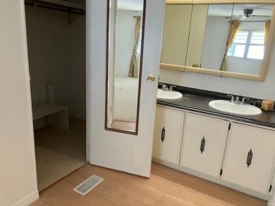 Welcome to this 2-bedroom, 2-bath manufactured home nestled in on Orange Blossom Hills Golf and Country Club in Florida - for sale on GolfHomes.com, golf home, golf lot