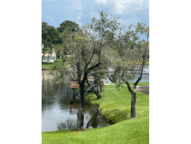 Recently updated Bridgewood 2 bedroom, 2.5 town house. Eastern on Boca West Golf and Country Club in Florida - for sale on GolfHomes.com, golf home, golf lot