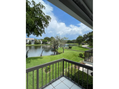 Recently updated Bridgewood 2 bedroom, 2.5 town house. Eastern on Boca West Golf and Country Club in Florida - for sale on GolfHomes.com, golf home, golf lot