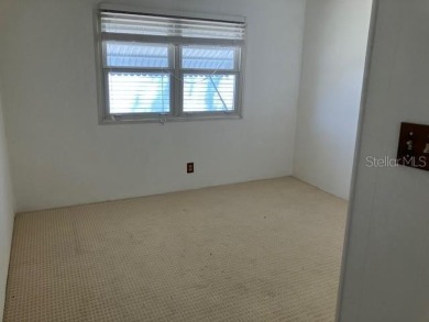 Welcome to this 2-bedroom, 2-bath manufactured home nestled in on Orange Blossom Hills Golf and Country Club in Florida - for sale on GolfHomes.com, golf home, golf lot