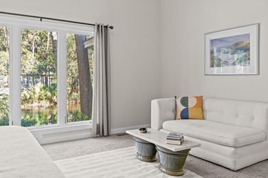 This impeccably maintained & elegantly presented lagoon front on The Seabrook Island Club in South Carolina - for sale on GolfHomes.com, golf home, golf lot