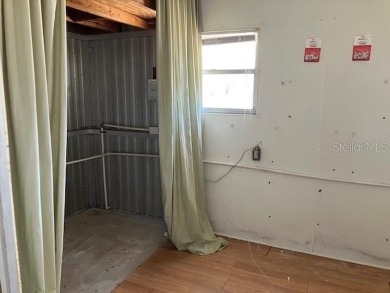 Welcome to this 2-bedroom, 2-bath manufactured home nestled in on Orange Blossom Hills Golf and Country Club in Florida - for sale on GolfHomes.com, golf home, golf lot