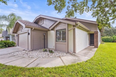 Enjoy the ease of maintenance-free living in the highly on Palm Aire Country Club of Sarasota in Florida - for sale on GolfHomes.com, golf home, golf lot
