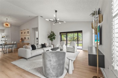 Enjoy the ease of maintenance-free living in the highly on Palm Aire Country Club of Sarasota in Florida - for sale on GolfHomes.com, golf home, golf lot