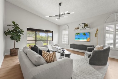 Enjoy the ease of maintenance-free living in the highly on Palm Aire Country Club of Sarasota in Florida - for sale on GolfHomes.com, golf home, golf lot