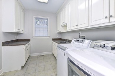 Stunning, brick, traditional home in The Governors Land at Two on Two Rivers Country Club in Virginia - for sale on GolfHomes.com, golf home, golf lot