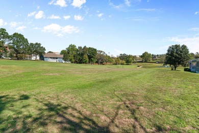 Located in the highly sought-after Point Royale community in on Pointe Royale Village Country Club in Missouri - for sale on GolfHomes.com, golf home, golf lot