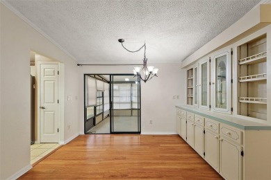 This 2 bedroom 2 bath home is situated on an oversized lot just on Bay Tree Golf Course in Florida - for sale on GolfHomes.com, golf home, golf lot