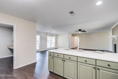 Welcome to this fully renovated, move-in ready ranch home in on Diamondhead Country Club in Mississippi - for sale on GolfHomes.com, golf home, golf lot