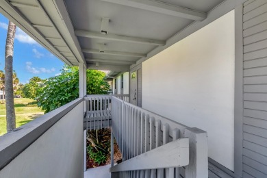 LIVE THE BOCA WEST LIFESTYLE. Second Floor garden apartment with on Boca West Golf and Country Club in Florida - for sale on GolfHomes.com, golf home, golf lot