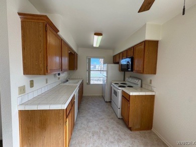 Country Club Condo Life is a wonderful thing! Chaparral Terrace on Chaparral Golf and Country Club in Arizona - for sale on GolfHomes.com, golf home, golf lot