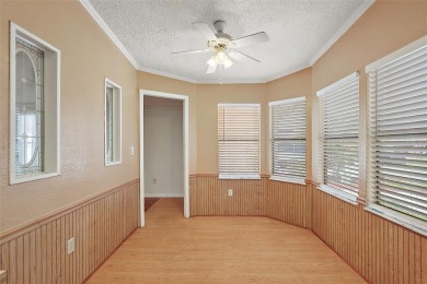 This 2 bedroom 2 bath home is situated on an oversized lot just on Bay Tree Golf Course in Florida - for sale on GolfHomes.com, golf home, golf lot