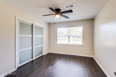 Welcome to this fully renovated, move-in ready ranch home in on Diamondhead Country Club in Mississippi - for sale on GolfHomes.com, golf home, golf lot