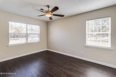 Welcome to this fully renovated, move-in ready ranch home in on Diamondhead Country Club in Mississippi - for sale on GolfHomes.com, golf home, golf lot