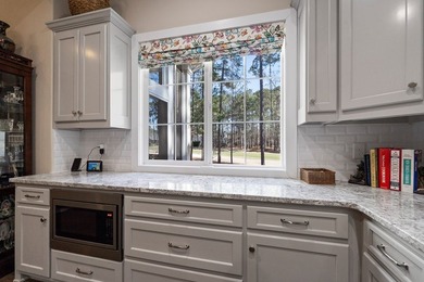 Located on the 8th hole of the prestigious Harbor Club Golf on Harbor Club Golf and Country Club in Georgia - for sale on GolfHomes.com, golf home, golf lot