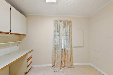 This 2 bedroom 2 bath home is situated on an oversized lot just on Bay Tree Golf Course in Florida - for sale on GolfHomes.com, golf home, golf lot