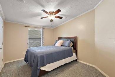 This 2 bedroom 2 bath home is situated on an oversized lot just on Bay Tree Golf Course in Florida - for sale on GolfHomes.com, golf home, golf lot