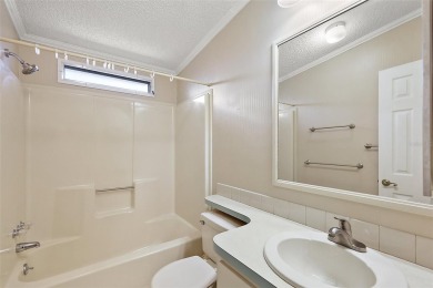 This 2 bedroom 2 bath home is situated on an oversized lot just on Bay Tree Golf Course in Florida - for sale on GolfHomes.com, golf home, golf lot