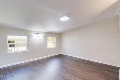 Welcome to this fully renovated, move-in ready ranch home in on Diamondhead Country Club in Mississippi - for sale on GolfHomes.com, golf home, golf lot