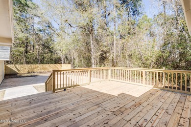 Welcome to this fully renovated, move-in ready ranch home in on Diamondhead Country Club in Mississippi - for sale on GolfHomes.com, golf home, golf lot