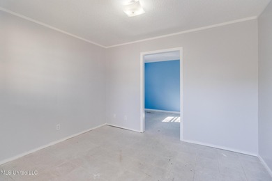 Welcome to this fully renovated, move-in ready ranch home in on Diamondhead Country Club in Mississippi - for sale on GolfHomes.com, golf home, golf lot