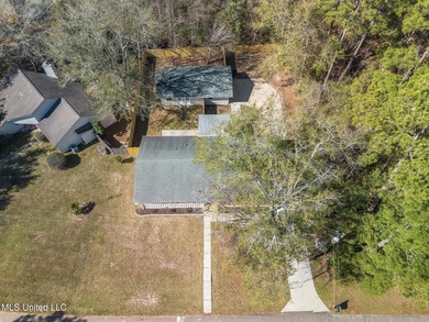 Welcome to this fully renovated, move-in ready ranch home in on Diamondhead Country Club in Mississippi - for sale on GolfHomes.com, golf home, golf lot
