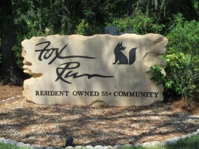This 2 bedroom 2 bath home is situated on an oversized lot just on Bay Tree Golf Course in Florida - for sale on GolfHomes.com, golf home, golf lot