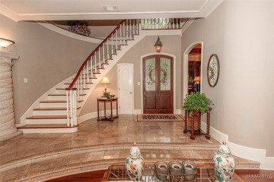 Step into the timeless elegance of this French Provincial on Wynlakes Golf and Country Club in Alabama - for sale on GolfHomes.com, golf home, golf lot