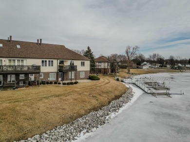 Welcome to this beautifully remodeled lakefront condo located on on Lakes of the Four Seasons Country Club in Indiana - for sale on GolfHomes.com, golf home, golf lot