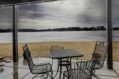 Welcome to this beautifully remodeled lakefront condo located on on Lakes of the Four Seasons Country Club in Indiana - for sale on GolfHomes.com, golf home, golf lot