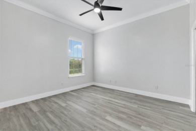 One or more photo(s) has been virtually staged. This stunning on Stonecrest Golf and Club Club in Florida - for sale on GolfHomes.com, golf home, golf lot