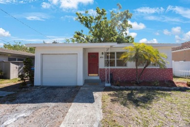 One or more photo(s) has been virtually staged. Charming on Mangrove Bay Golf Course in Florida - for sale on GolfHomes.com, golf home, golf lot